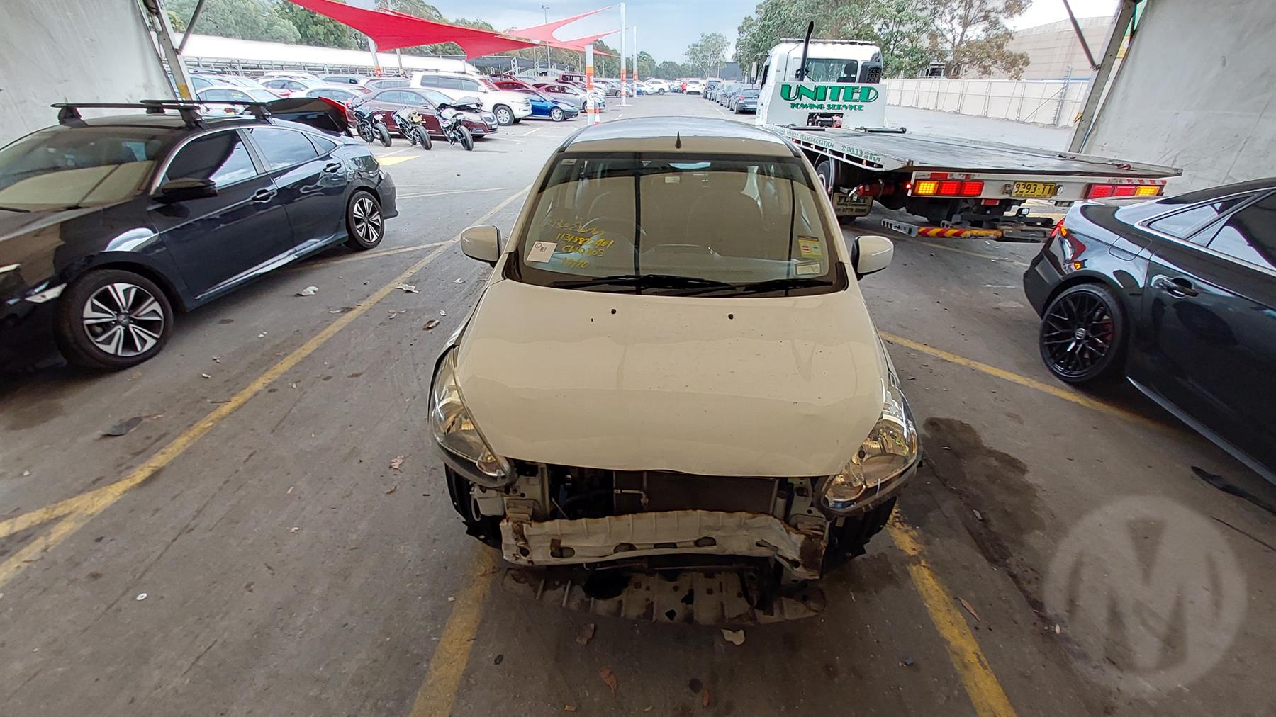 Damaged 2014 Mitsubishi Mirage LA ES Hatch Unknown For Auction in