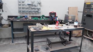 Workbench With Vice And Tools Engineering Equipment Photo