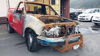 2002 Ford F150 XLT Utility Photo