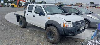 2010 Nissan Navara DX 4WD D/C 2.5D Dual Cab Utility Photo
