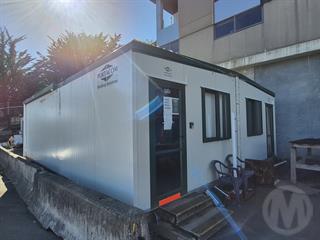 Custom Built Port-a-com Portable Building Photo