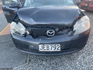 2006 Mazda Demio Coupé Photo