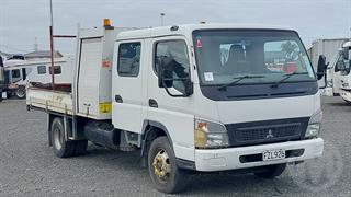 2011 Mitsubishi Fuso Canter FE190W2A Dual Cab Tipper GCM 7,500kg Photo