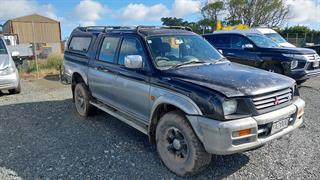 2000 Mitsubishi L200 Utility Photo