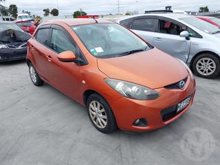 2010 Mazda Demio Coupé Photo